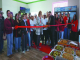 Crispy Ring cuts ribbon on donut shop
