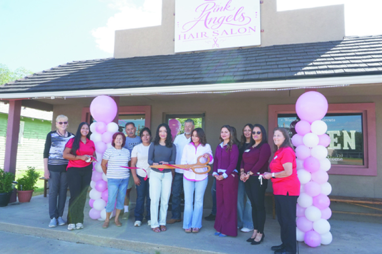 Pink Angels Hair Salon cuts ribbon on new salon