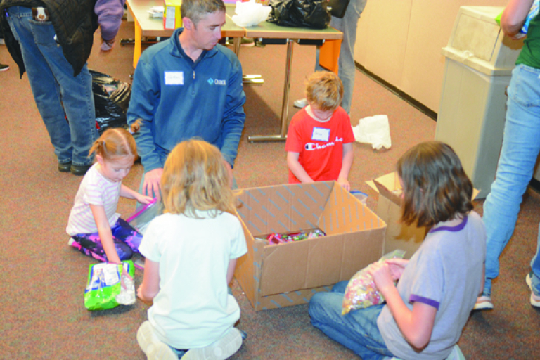 Presents in a Package coming via Volunteer Kansas