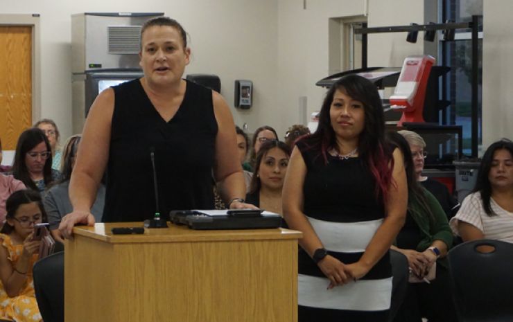 Multiple teacher recognitions at USD 480 meeting