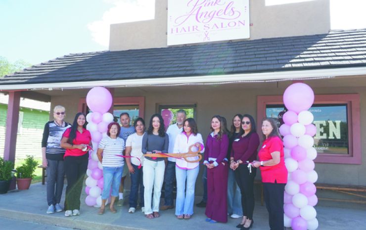 Pink Angels Hair Salon cuts ribbon on new salon
