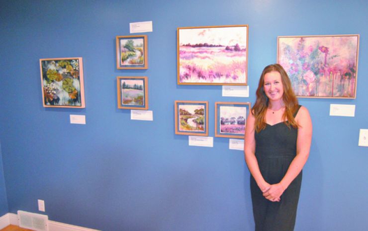 Hirt displays works in exhibit at Baker Arts Center