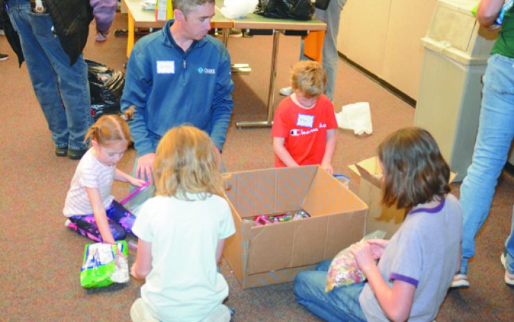Presents in a Package coming via Volunteer Kansas