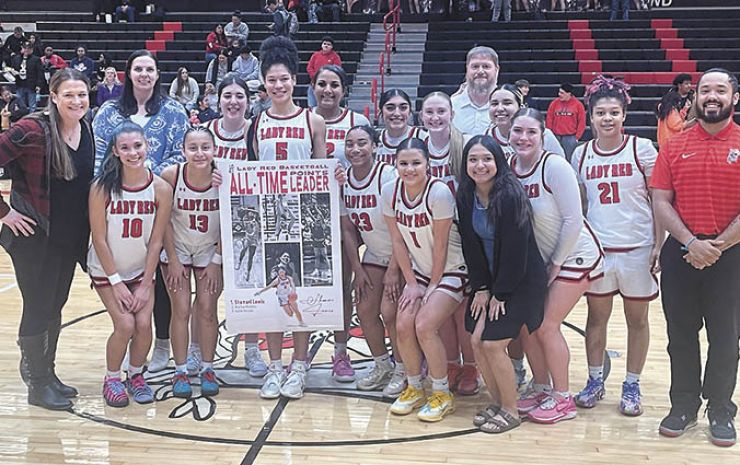 Lewis sets school scoring record in playoff win