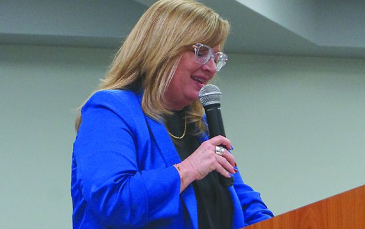 Mettlen shares story at Women's Day Luncheon